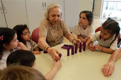 Lucrecia, a three-year resident of the LeDor VaDor senior complex in Buenos Aires, Argentina, garners strength from the weekly intergenerational activities with “her kids” at JDC’s Baby Help nursery and day care. 