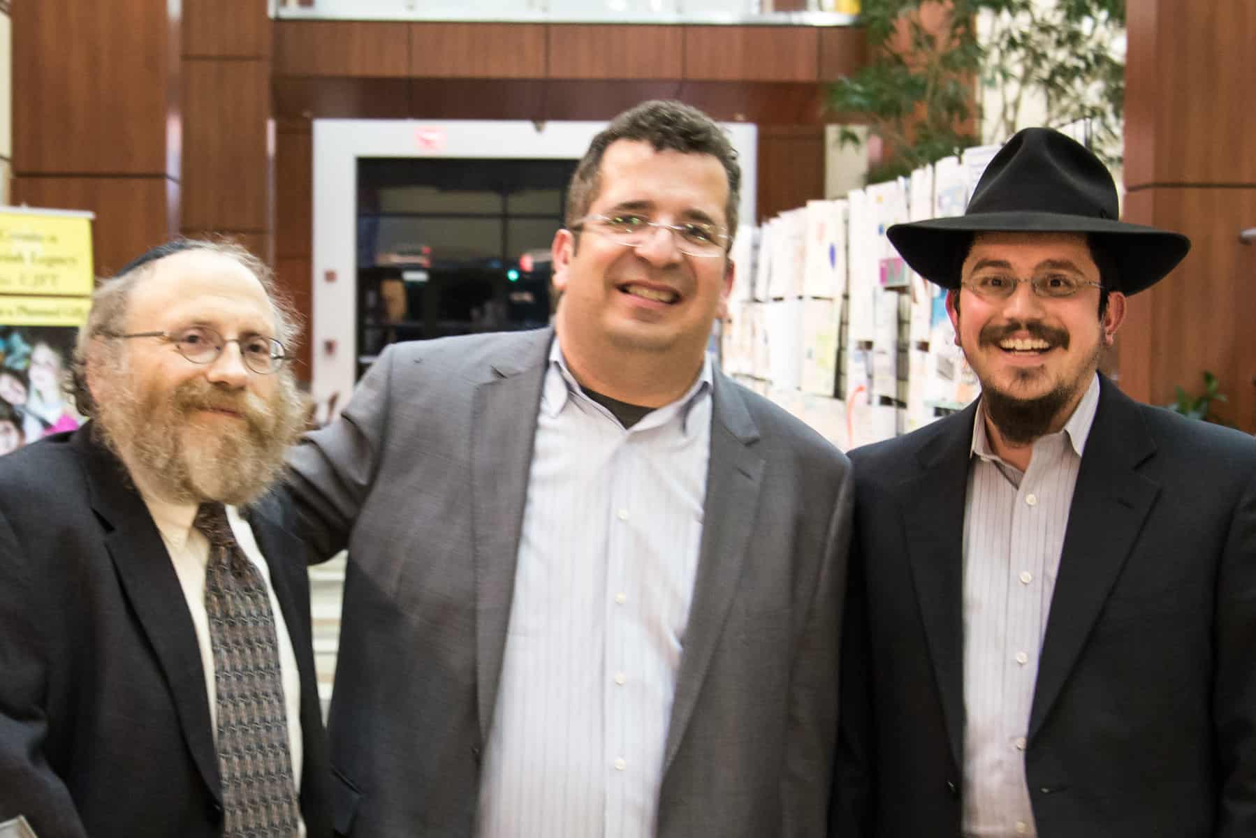 Rabbi Aron Margolin, Chabad of Tidewater director, Neil Lazarus, Rabbi Levi Brashevitsky, Chabad assistant director.
