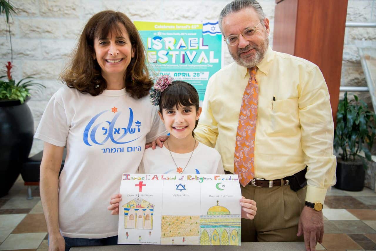 Dorothy and Elizabeth Hughes with Harry Graber, executive vice president, United Jewish Federation of Tidewater.