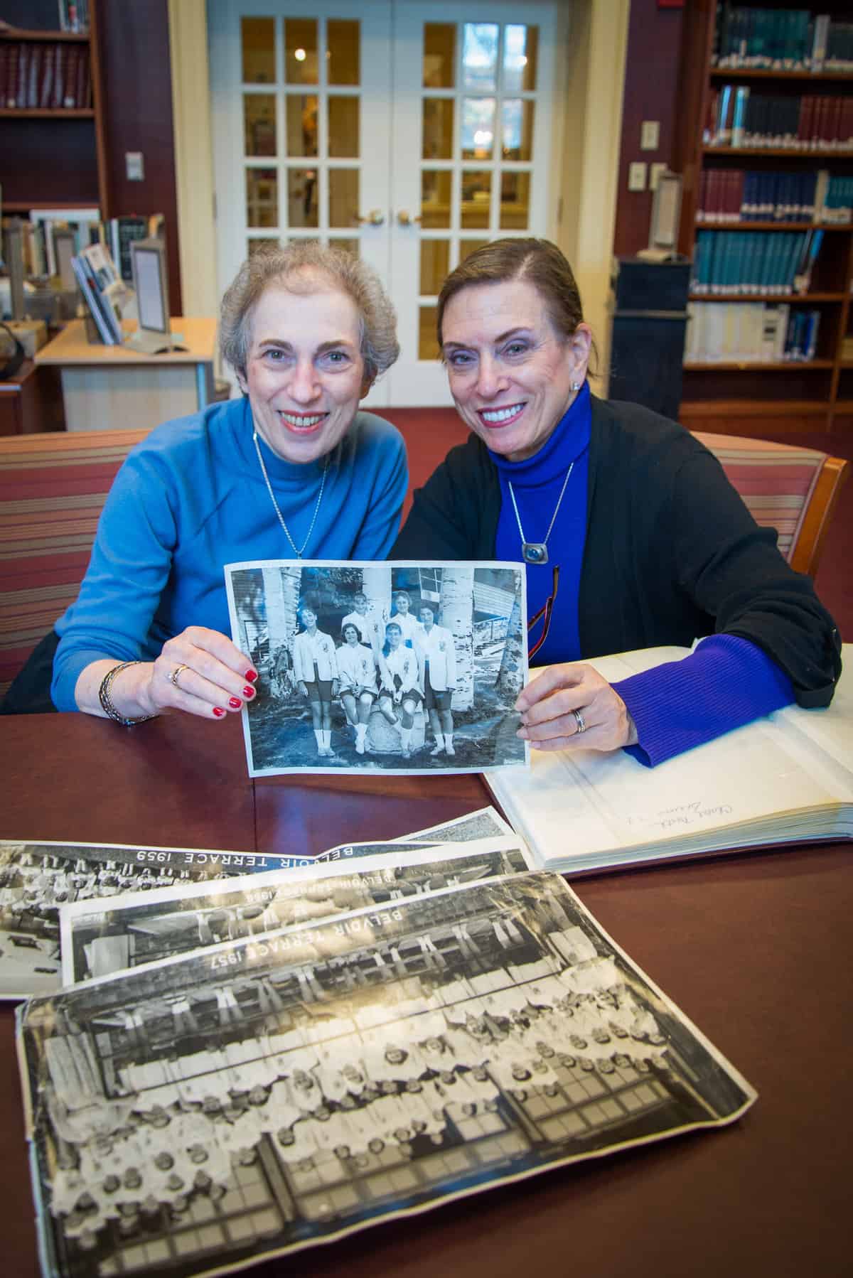 Rabbi Connie Golden and Leslie Legum with some treasured camp photos.