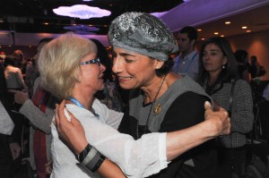 Laura Miller embraces BatGalim Shaer after giving away her Lion of Judah pin.