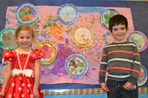 Ella Trompeter and Yonni Moallem show off their Seder plates.