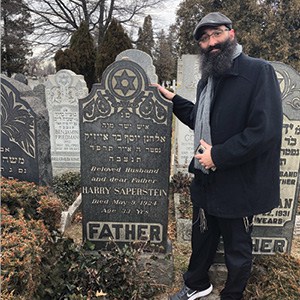 Jason Silverstein at the newly found resting place of his great grandfather.