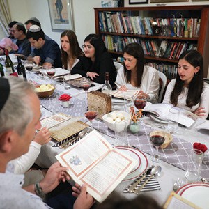 A family participates in the Passover seder.