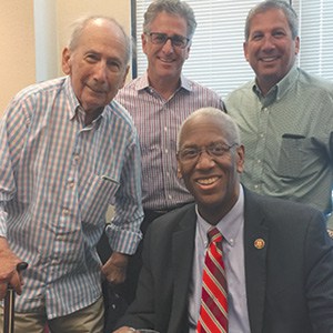 Arnold Leon, Kirk Levy, and Miles Leon with Congressman Donald McEachin.
