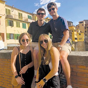 Jared Berklee (top right) at the Arno River by the Ponte Vecchio—oldest bridge across the Arno River– in Florence, Italy with other BBYO representatives.