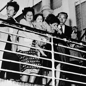 Ohef Sholom Temple Archives Passengers of the S.S. Quanza, docked in Norfolk harbor, 1940, while their fate hangs in the balance, prohibited by US immigration law from disembarking.