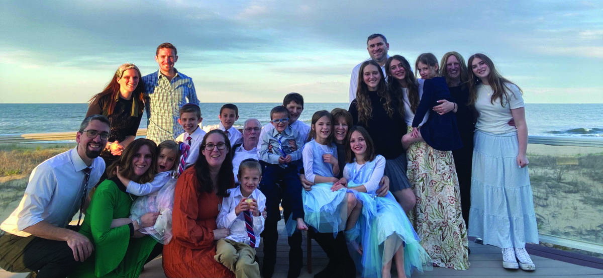 Jon and Susan Becker (seated) surrounded by their children and grandchildren.