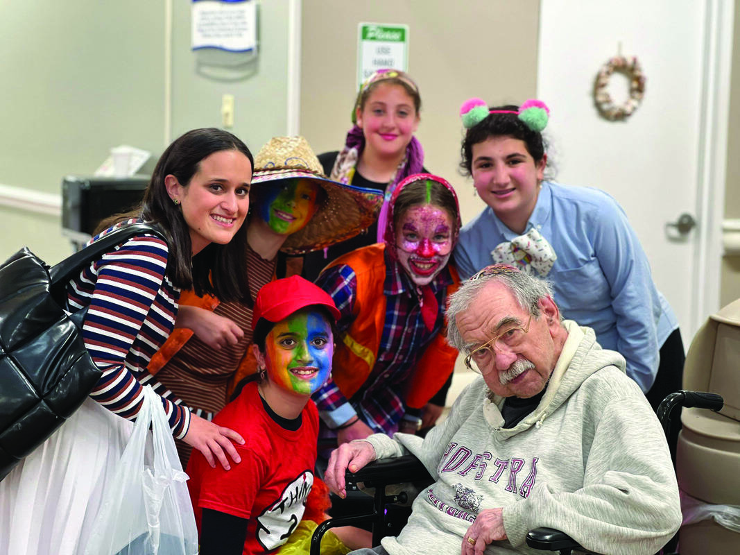 Kayla Weinreb, Miri Danizger, Sari Weinreb (front row), Sarah Eidel Stettin, Hodaya Hezi (back row), Yehudis Lipman, and Dean Casper.