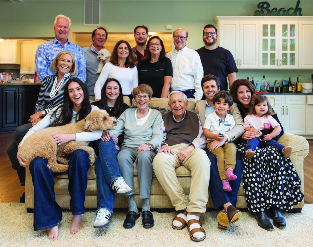 Leonette and Beryl Adler (center) with their family.