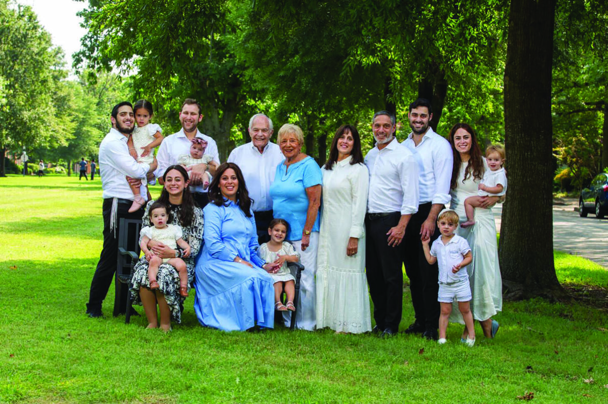 Lenny and Ellie (center) with their family.