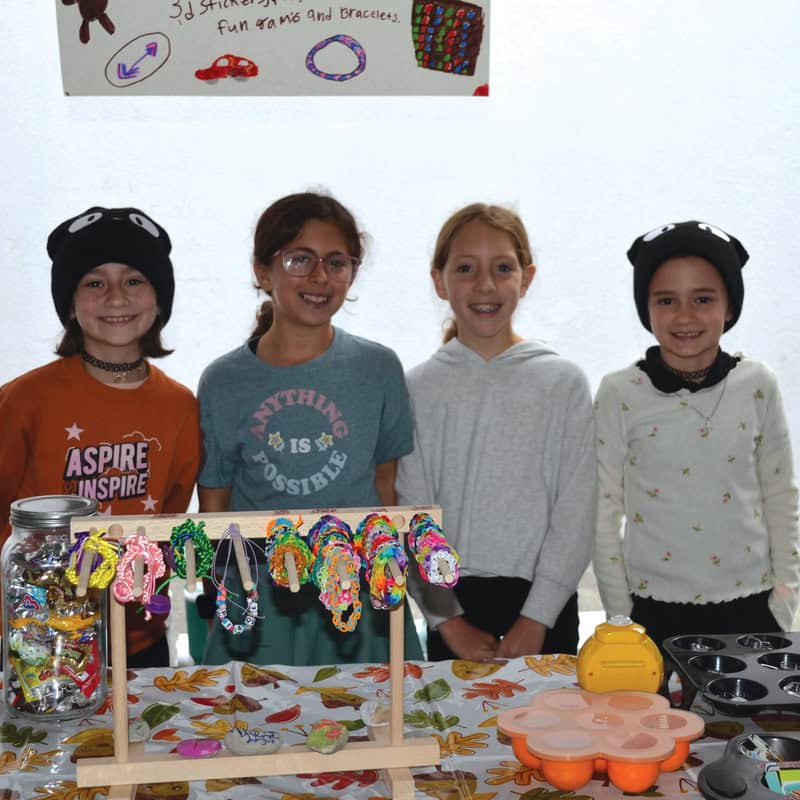 SIA students run a booth.