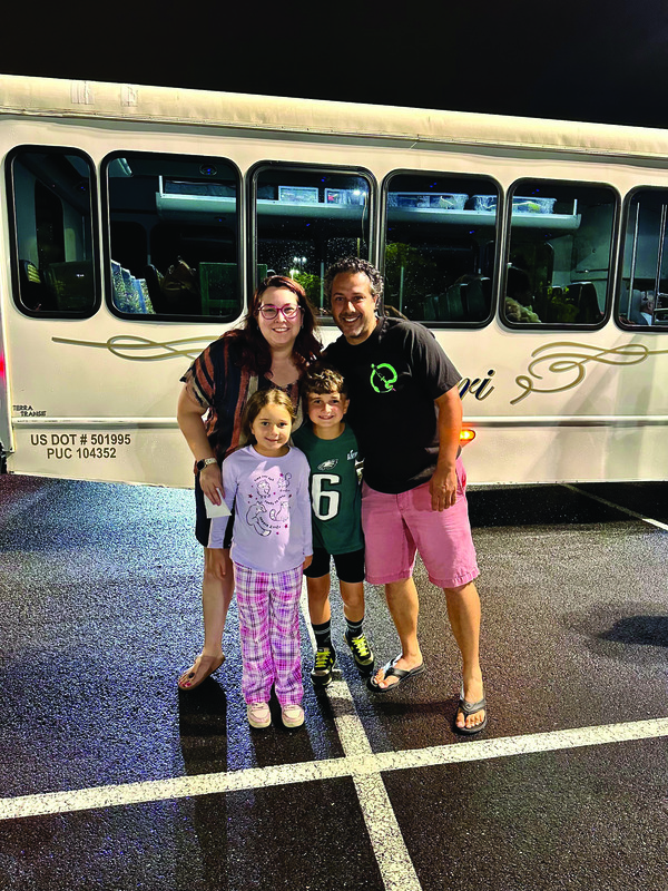 The Weinstein family: Amy, Eliot, Dani, and Avi at the bus for Camp Harlam.