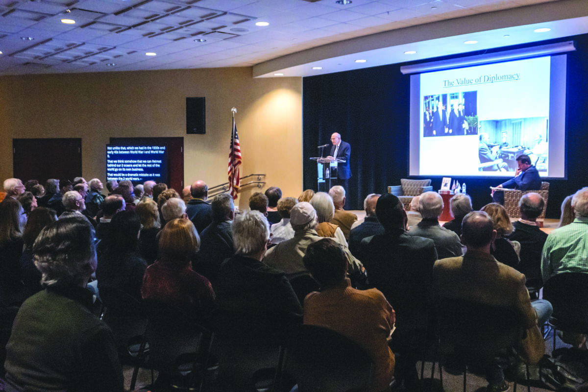 Ambassador Stuart Eizenstat speaks to a packed audience.