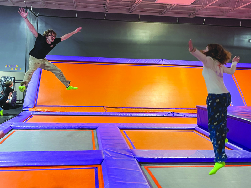 Henry Ashe and his sister, Hazel, jump high. 