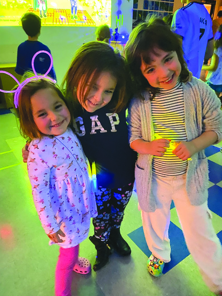 Glow party: Sisters Emelia and Scarlett St. Pierre and friend Noa Glaser at the Glow Party in December.