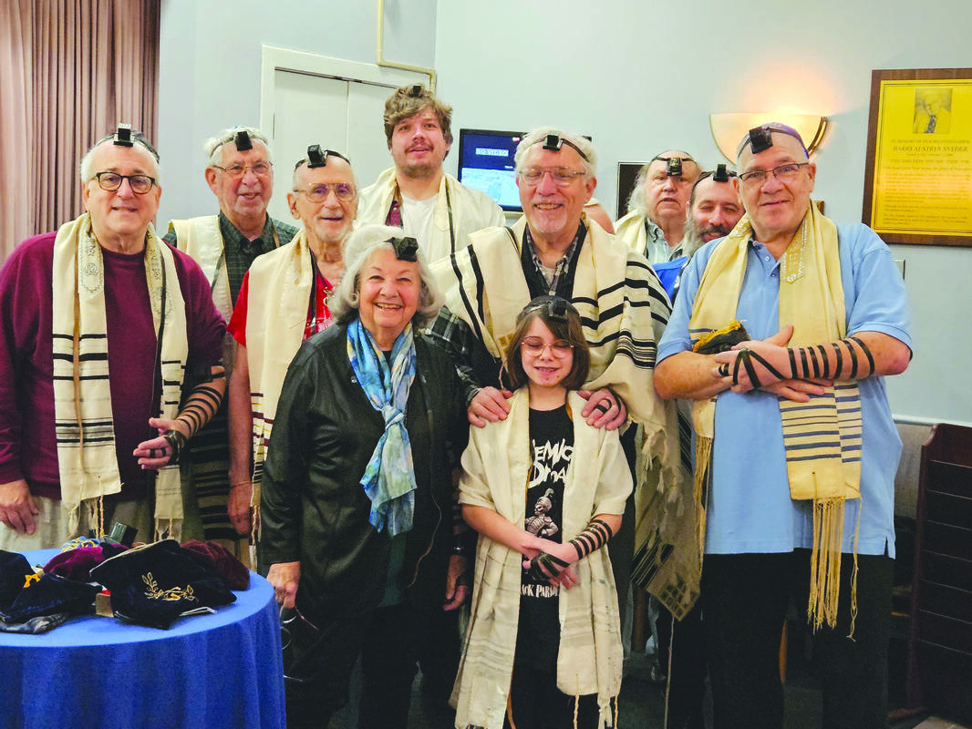 Front row: Shirley Confino Rehder and Nayleigh Shannon. Second row: Norman Soroko, Mark Solberg, Rabbi Michael Panitz, and Richard Yanku. Third row: Jim Gordon, Brendan Wagner, Dr. Reuven Rohn, Kerry Harte, and Bernie Quelsner.