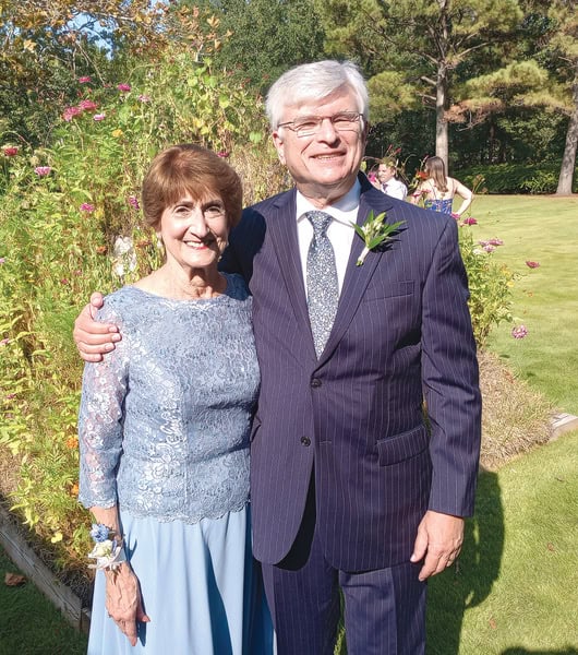 Linda and Jonathan at their granddaughter's wedding in 2022.