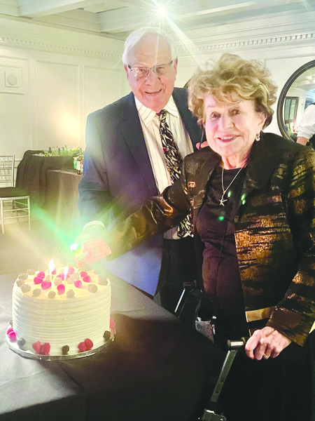 Jack and Beverly cut their 70th anniversary cake in Boca Raton, Fla.