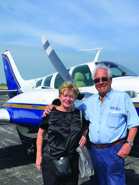 The Foxes with their Beechcraft Baron airplane.