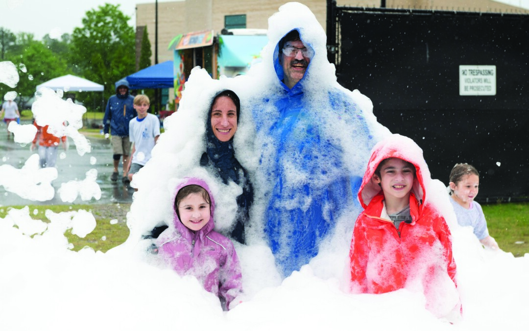 Rain couldn’t dampen the fun at the 21st Annual Run, Roll, or Stroll