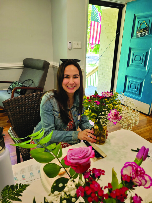 Jessica Glasser creates a beautiful floral centerpiece.