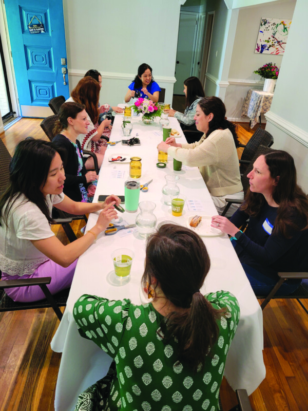 Moms of infants and toddlers come together for a UJFT YAD Brunch at the home of Bo Lepchitz (at the head of the table).
