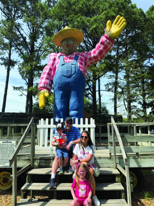 The Oliszewski family enjoys the warm day together.