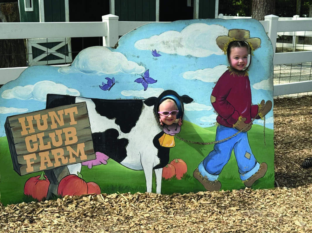 Makinley and Liliana Beasley make silly poses.