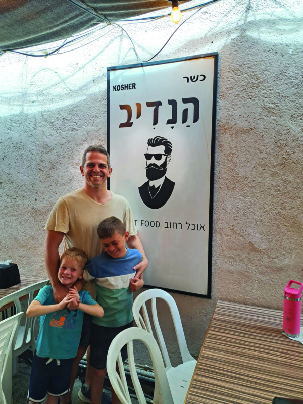 Danny Rubin and his boys, Niv and Shai, dine at The Nadiv restaurant in Zichron Yaacov. The Zichron region is influenced by the philanthropic efforts in the late 19th century of Baron Edmond de Rothschild, also known as “HaNadiv” or “The Great Benefactor.”