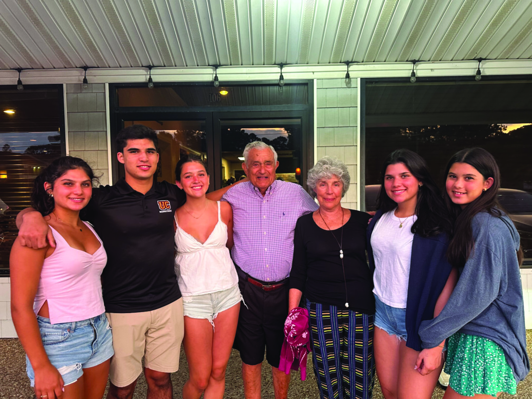 Susan and Jim Eilberg surrounded by grandchildren.