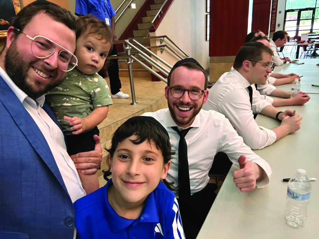 Shalom, Tzvi, and Aharon Markman with the Maccabeats.