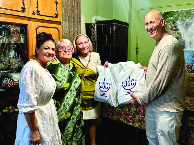 The JDC group had kiddish with Elana, a 90-year-old Holocaust survivor, who then changed her dress and accompanied them to a conservative Kabbalat Shabbat service and dinner in Ukraine.