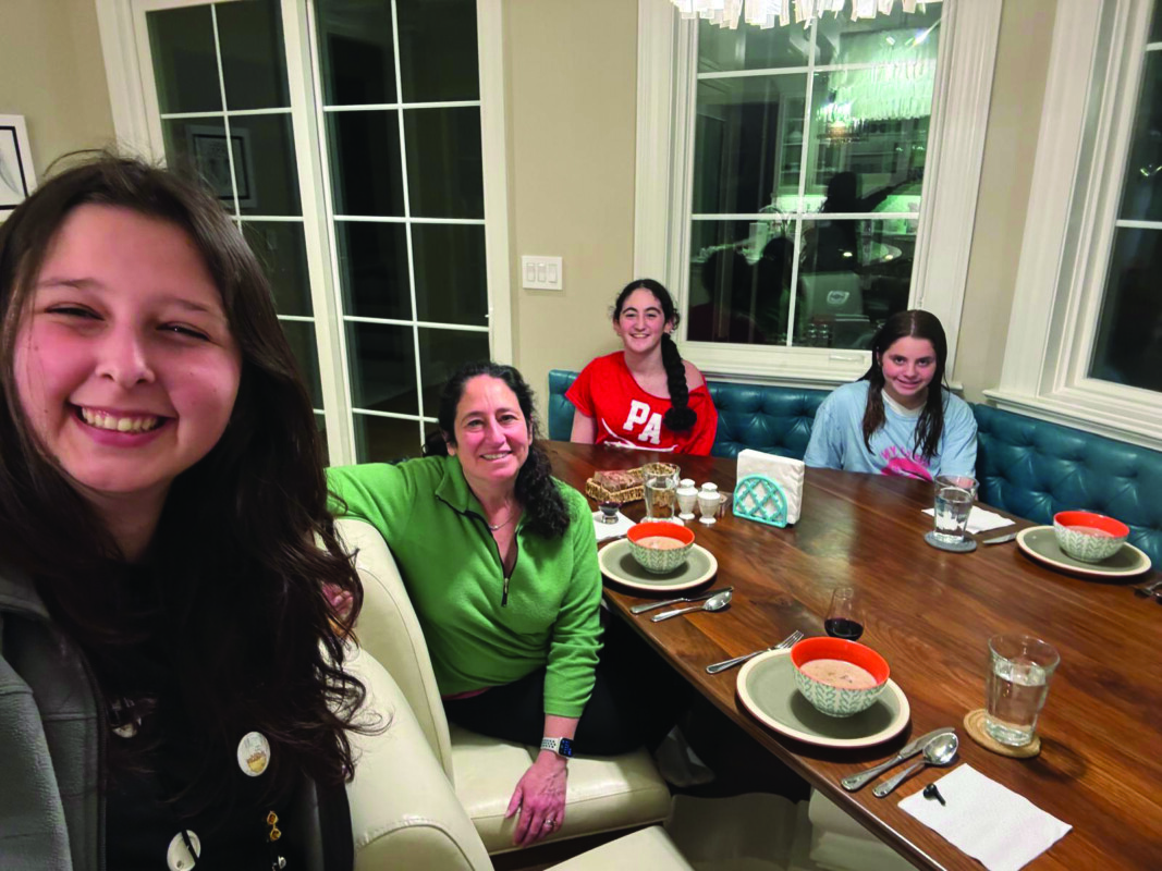 Emily Patyuk with her host family, the Portnoys.
