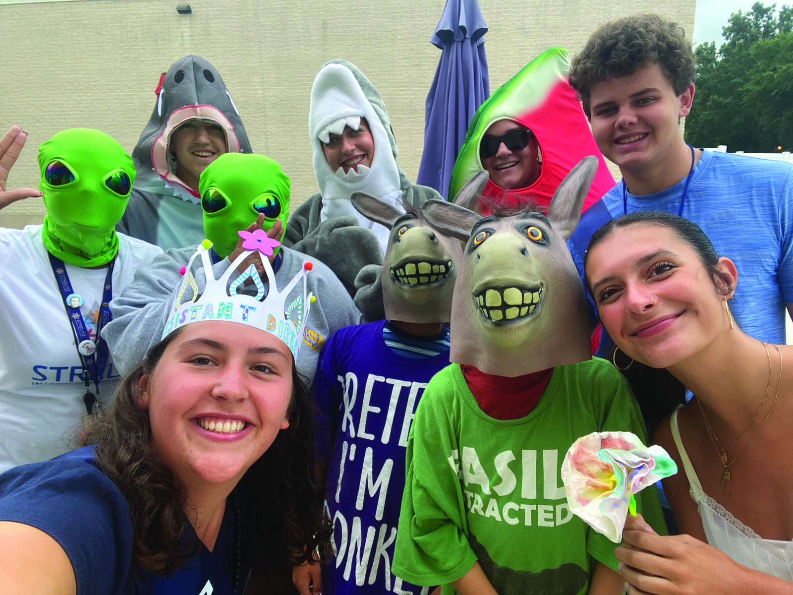 The wedding party moments before walking down the aisle at the “Donkey Wedding.” Front Row: Camp JCC Assistant Director Kate-Lynn Cipolla, Donkey Clone 2, and Lizz Hughes. Second Row: Alien 1, Alien 2, Donkey Clone 1, Bryan Hooks. Top Row: Benjamin Martin, Danielle Hartman, and Riley Salway.