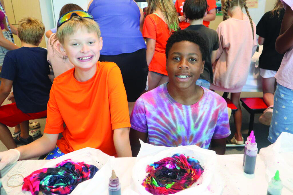 Remembering the 70’s with Tie Dye during “Eras Week.” William Salyer and Dhani Richardson. 