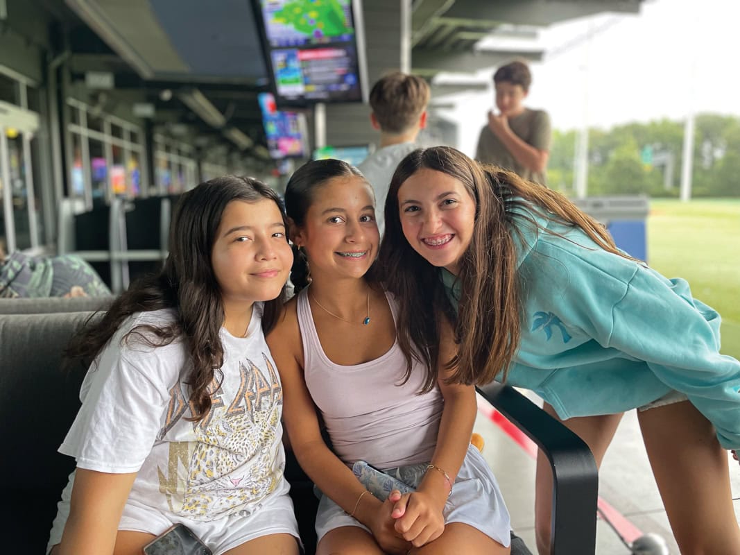 New members Shai Zittrain and Kenna Werby with prospect Isabella Levitt.