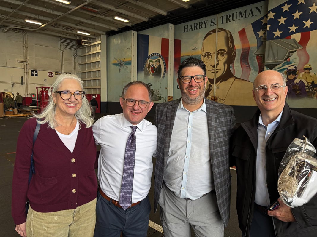 Deb Segaloff, Aaron Kass, Jason Hoffman, and Paul Peck at the minyon aboard the USS Harry S. Truman.