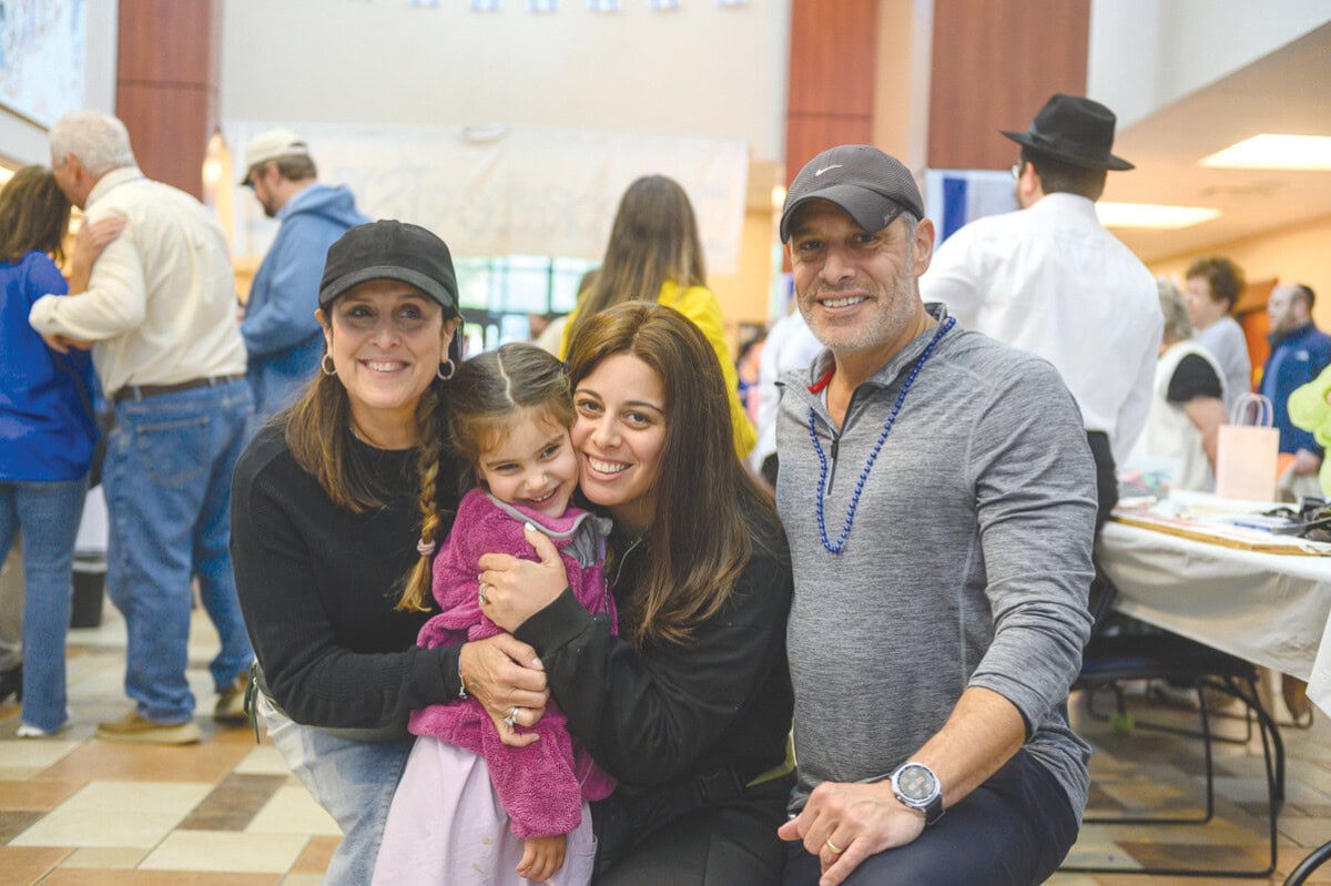 Amy Brooke, Anna and Chana Horowitz, and Jeff Brooke.