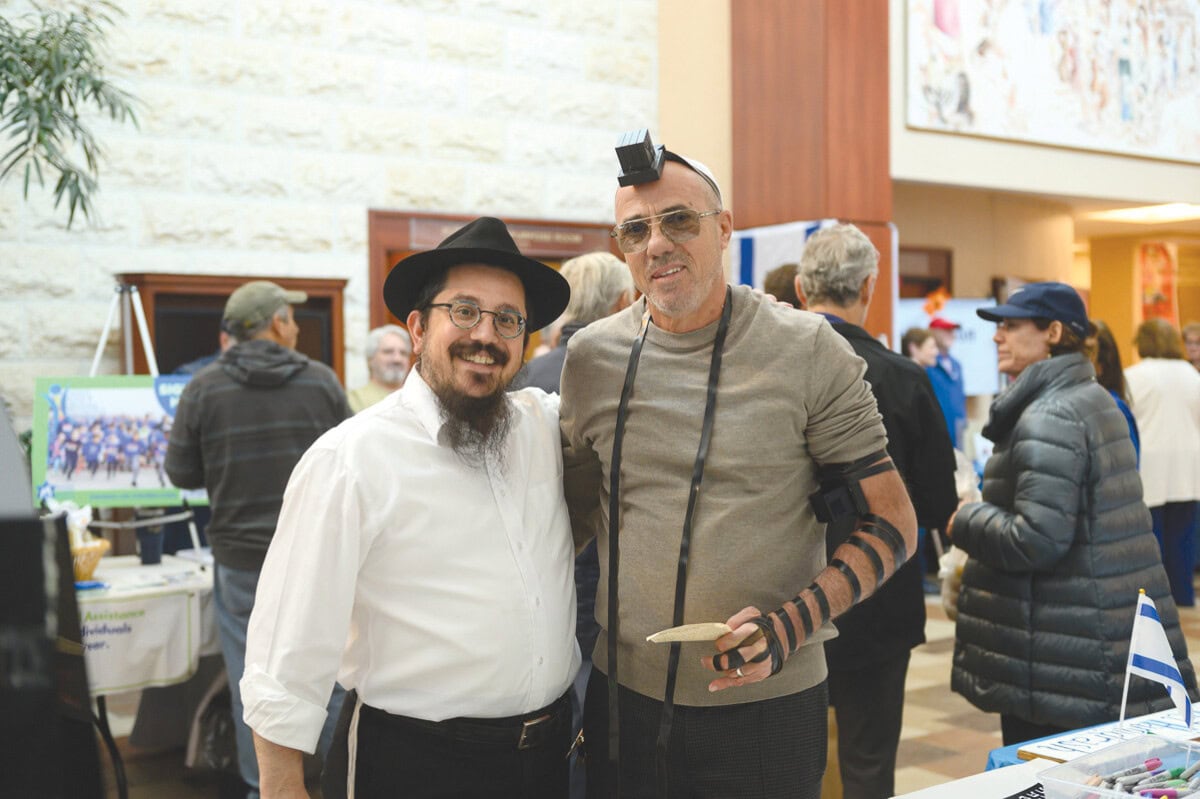 Rabbi Levy Brashevitzky and Sammy Alofer.
