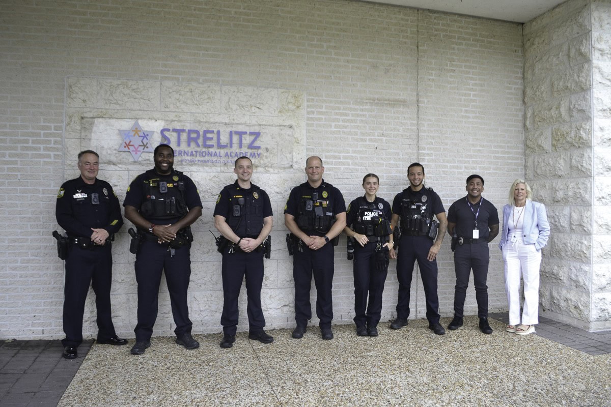 Heather Moore, SIA Head of School, (right) with the Virginia Beach Police Department on opening day.