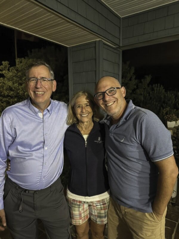 Larry Weinstein, Stephanie Calliott, and Rabbi Ari Oliszewski from Temple Emanuel.