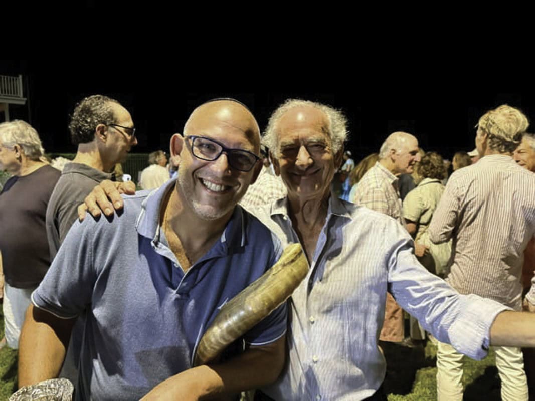 Rabbi Ari Oliszewski and Larry Siegel.