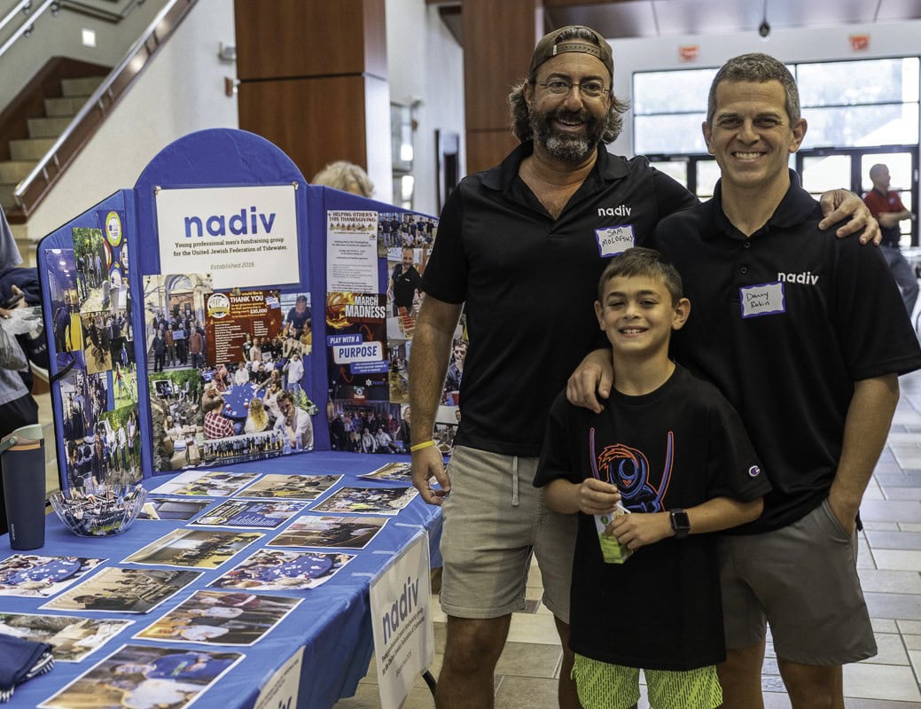 NADIV table: Sam Molofsky and Danny and Niv Rubin.