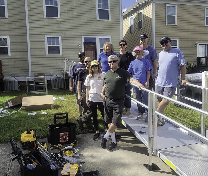 Beth Sholom Village volunteers roll up their sleeves to construct a ramp for a disabled Portsmouth manNew BSV Fund paid for the aluminum ramp