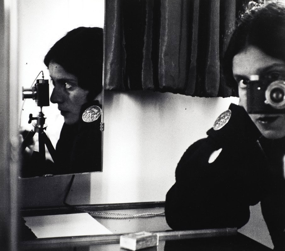 lse Bing (American, b. Germany, 1899–1998), Self-Portrait with Leica, 1931, Gelatin silver print, Museum purchase, 2025.74.1. This exhibition is organized by the Chrysler Museum of Art and curated by Mia Laufer, PhD, Irene Leache Curator of European Art.