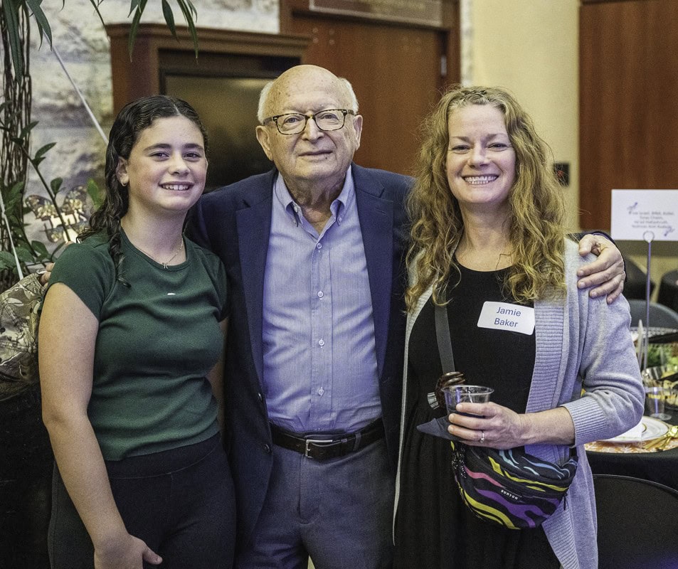 Willow Baker, Rabbi Israel Zoberman, and Jamie Baker.