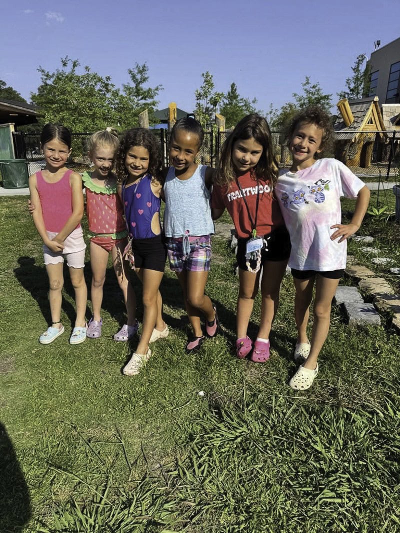 Lyla Tamborski, Lena Carden, Liv Cohen, Willow Gordon, Izzy Aviv, and Eleanor Sheffy soak up the sunshine at Camp JCC.