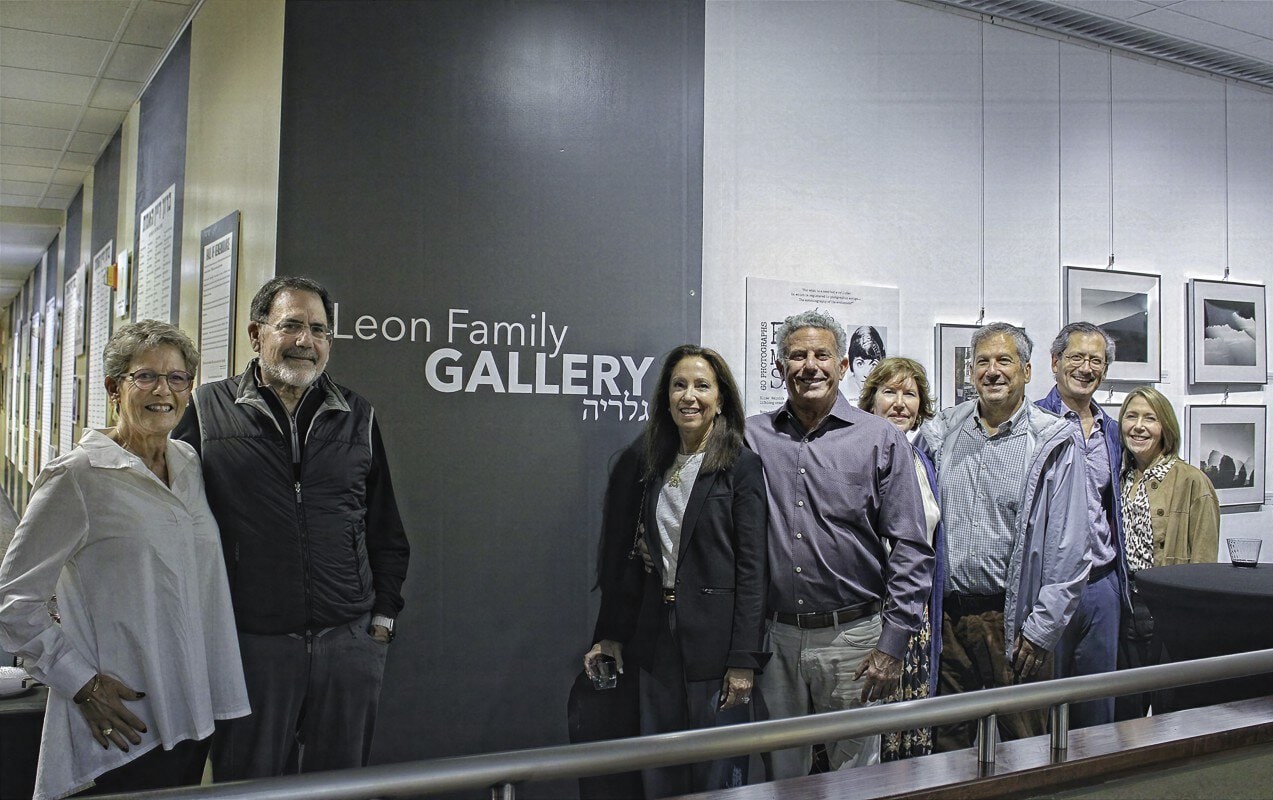 Kim Simon Fink, Ben Simon, Shelly and Britt Simon, Sandra and Miles Leon, and Steve and Caren Leon at the opening of 60 Photographs by Elise Melnick Simon.