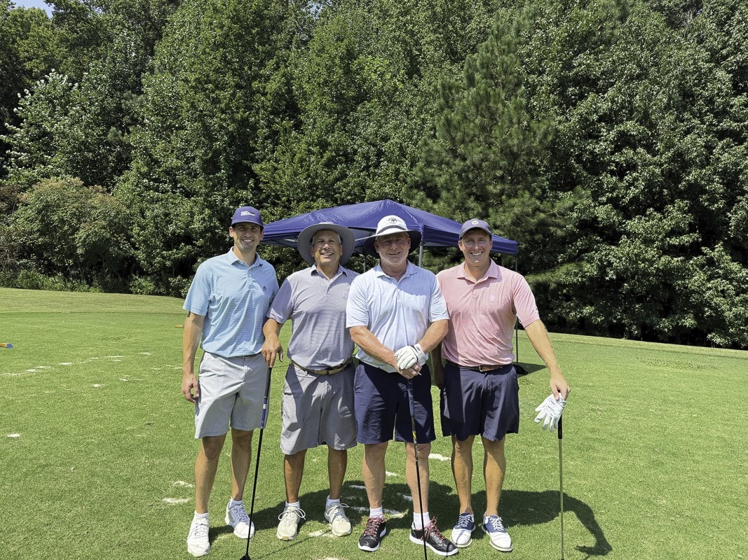 Winning team: Ben Leon, Miles Leon, Matt Fine, and Wes Bourdon.